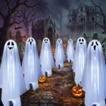Set of 6 solar ghost stake lights with cool white illumination for outdoor Halloween garden and pathway decorations